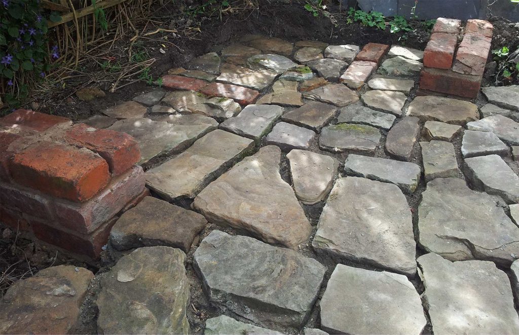 Patio laid around the bench base