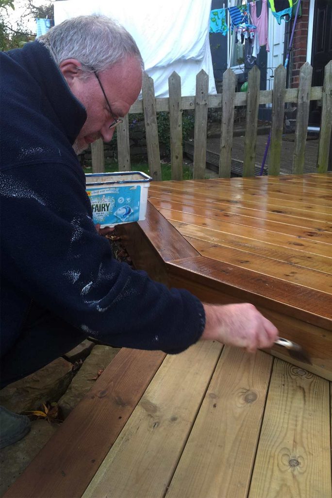 Oiling the deck with a light oak stain