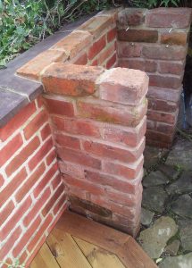 BBQ with the bricks and coping stones stained to match