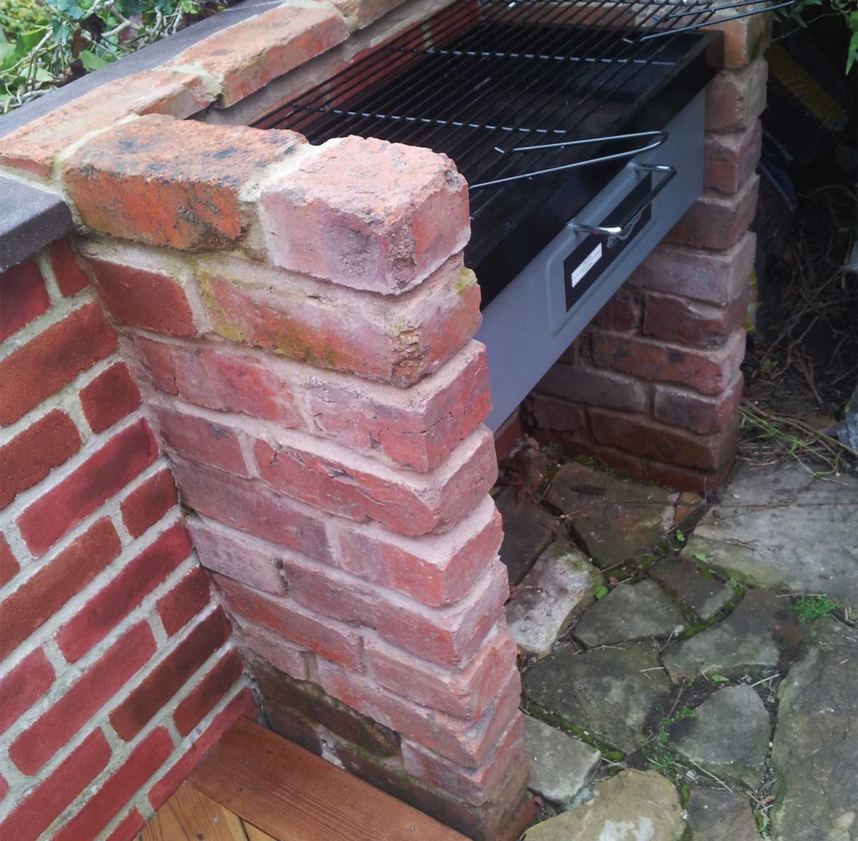 Barbecue complete with recoloured wall and coping stones