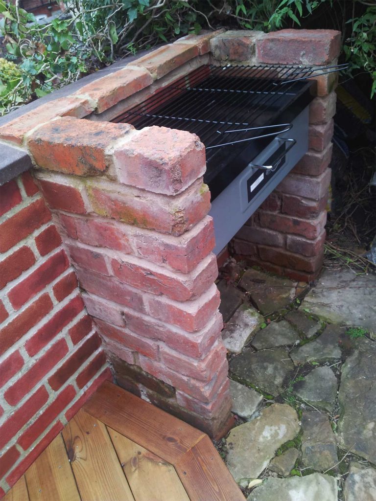 Barbecue complete with recoloured wall and coping stones