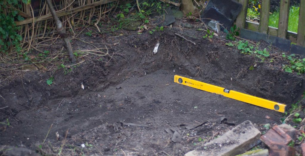 Ground cleared to set concrete footings