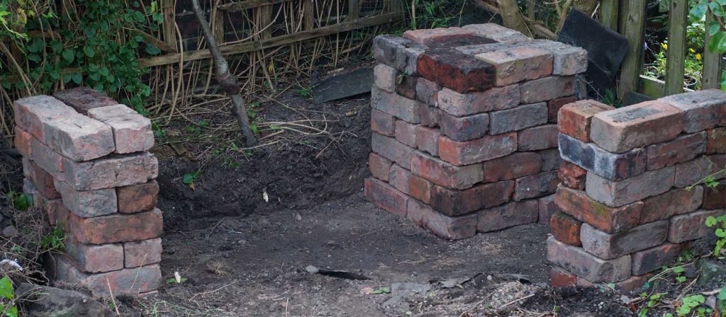 Bricks stacked to get a visual feel and position for the bench