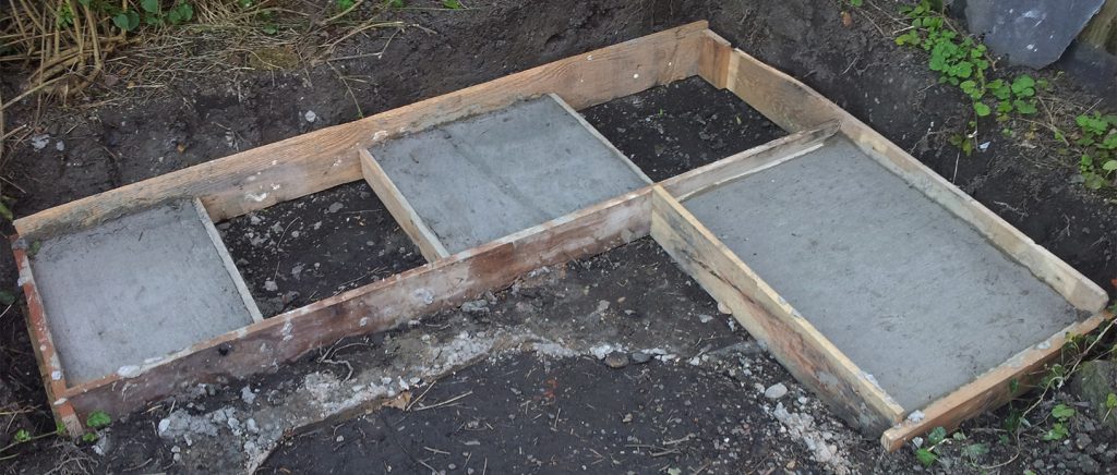 Concrete footings including shuttering