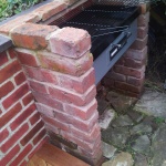 Barbecue complete with recoloured wall and coping stones